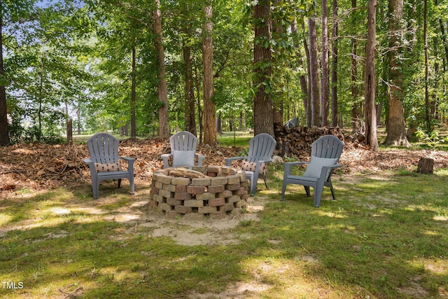 view of yard with a fire pit