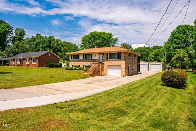 view of front of property with brick siding, stairway, a front yard, a chimney, and driveway
