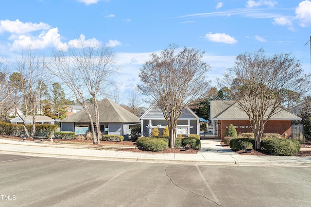 view of front of property featuring brick siding