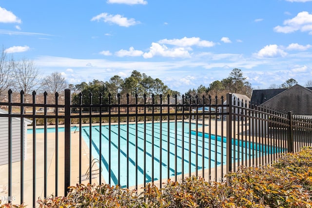 community pool with fence