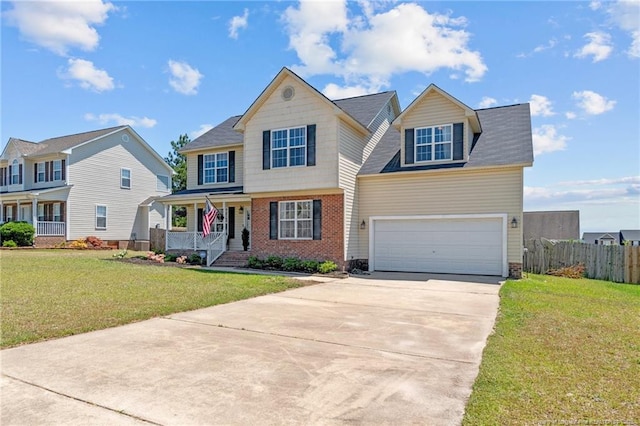 traditional home featuring a porch, fence, driveway, and a front yard