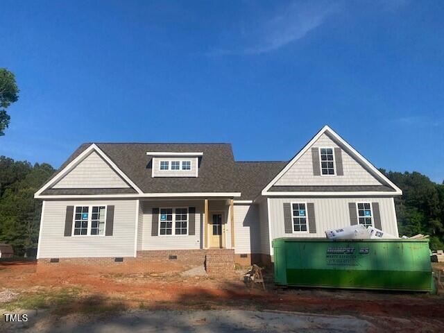 view of front of house featuring crawl space