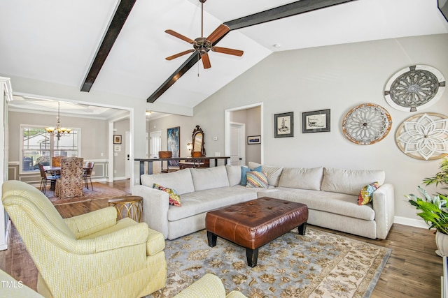 living area featuring baseboards, lofted ceiling with beams, ceiling fan with notable chandelier, and wood finished floors