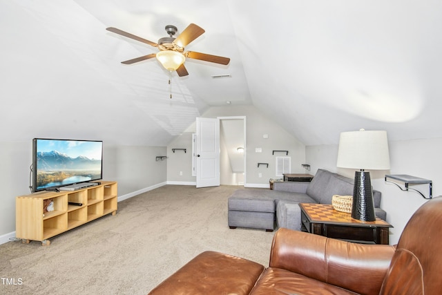 carpeted living room featuring baseboards, ceiling fan, vaulted ceiling, and visible vents