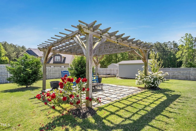 view of yard with a patio, a pergola, and a fenced backyard