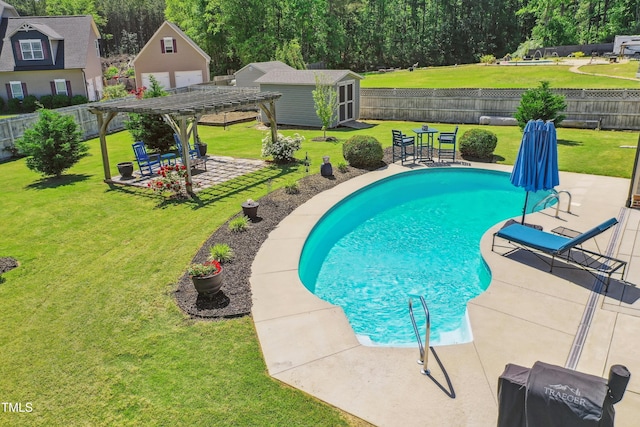 view of swimming pool with an outdoor structure, a fenced backyard, a patio area, and a lawn
