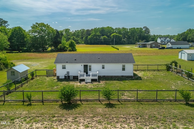 640 Short Journey Rd, Smithfield, NC 27577 - rear view of property with crawl space, an outbuilding, a fenced backyard, and a deck