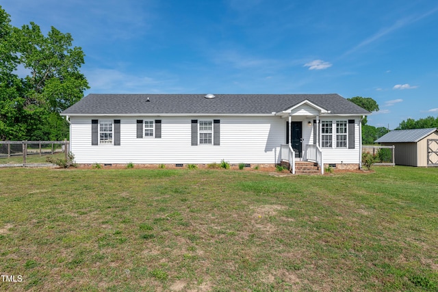 640 Short Journey Rd, Smithfield, NC 27577 - ranch-style house featuring crawl space, fence, an outdoor structure, a front lawn, and a storage unit