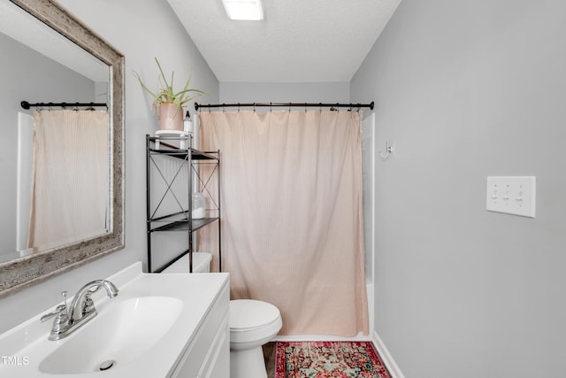 640 Short Journey Rd, Smithfield, NC 27577 - bathroom featuring a textured ceiling, tile patterned flooring, vanity, toilet, and shower / tub combo with curtain