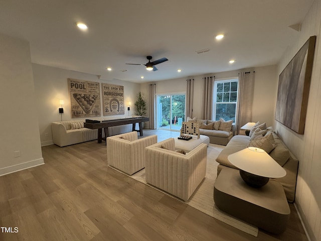 5906 Dunzo Dr, Raleigh, NC 27617 - living area featuring recessed lighting, a ceiling fan, and light wood-style floors