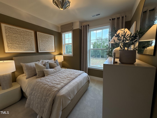 5906 Dunzo Dr, Raleigh, NC 27617 - carpeted bedroom with baseboards