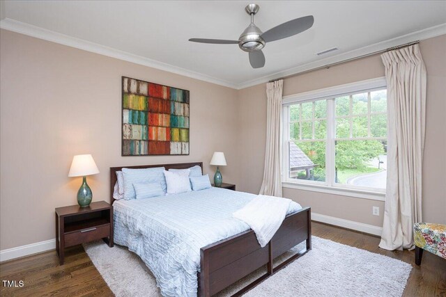 3601 Nightfall Ct, Raleigh, NC 27607 - bedroom featuring baseboards, ornamental molding, wood finished floors, and ceiling fan