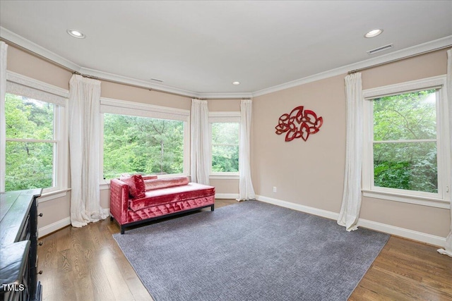 3601 Nightfall Ct, Raleigh, NC 27607 - living area with baseboards, ornamental molding, wood finished floors, and recessed lighting
