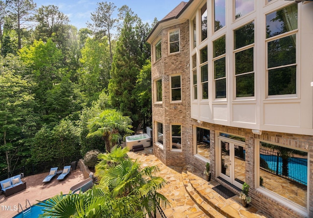 3601 Nightfall Ct, Raleigh, NC 27607 - view of patio with a hot tub