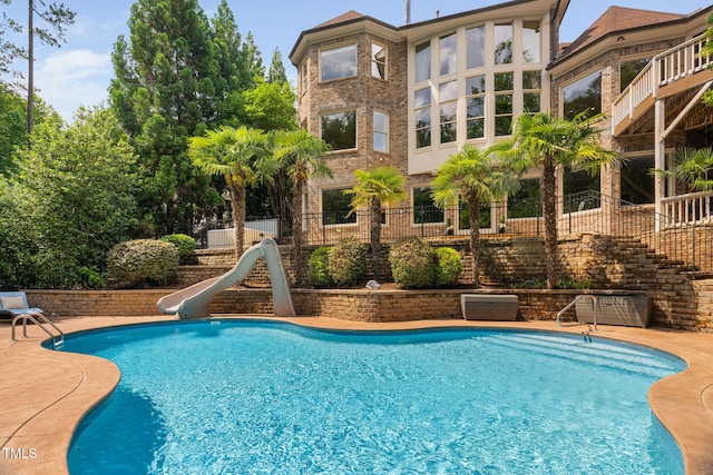 3601 Nightfall Ct, Raleigh, NC 27607 - view of pool featuring a water slide and fence