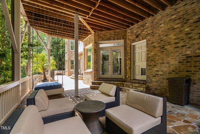 3601 Nightfall Ct, Raleigh, NC 27607 - view of patio featuring french doors and an outdoor living space