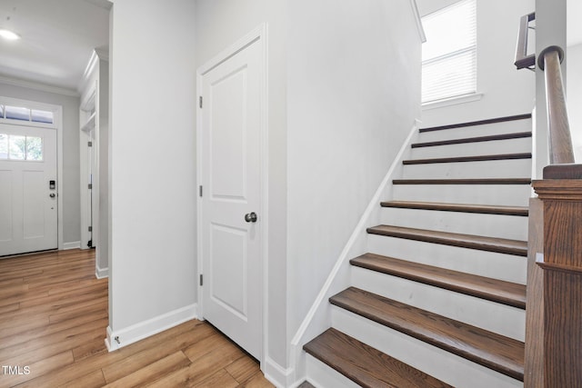 521 Marion Hills Way, Knightdale, NC 27545 - staircase with crown molding, baseboards, and wood finished floors