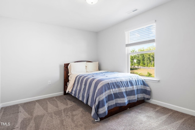 521 Marion Hills Way, Knightdale, NC 27545 - bedroom with baseboards, carpet, and visible vents