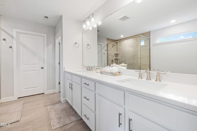521 Marion Hills Way, Knightdale, NC 27545 - full bath with a sink, a stall shower, double vanity, and visible vents