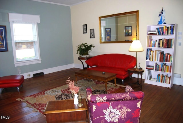 1013 Green St, Durham, NC 27701 - living room with baseboards, ornamental molding, and wood finished floors