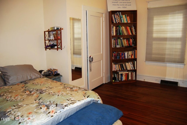 1013 Green St, Durham, NC 27701 - bedroom featuring dark wood-style flooring and visible vents