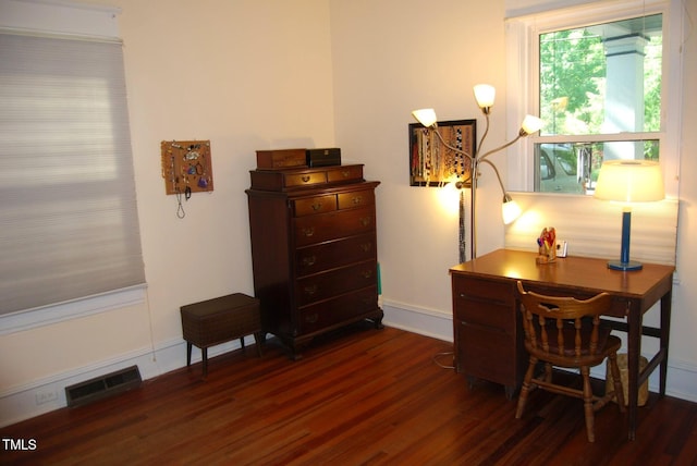1013 Green St, Durham, NC 27701 - home office featuring baseboards, visible vents, and wood finished floors