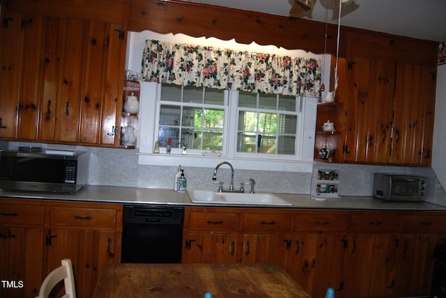 1013 Green St, Durham, NC 27701 - kitchen featuring brown cabinets, stainless steel microwave, a sink, and dishwasher
