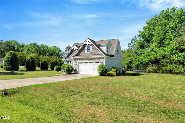 2062 Montgomery Dr, Franklinton, NC 27525 - view of front of home with driveway, stone siding, a front lawn, and a garage