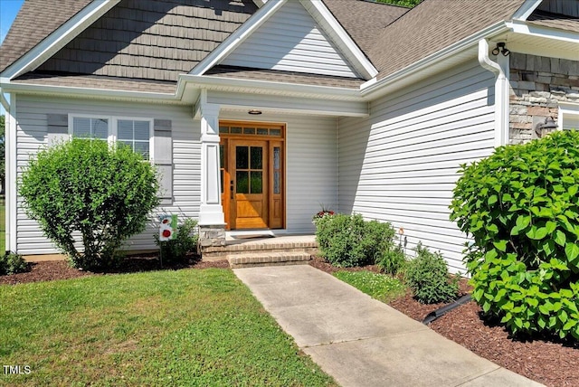 2062 Montgomery Dr, Franklinton, NC 27525 - property entrance with a shingled roof and a yard