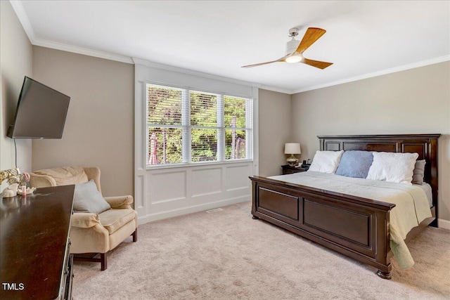2062 Montgomery Dr, Franklinton, NC 27525 - bedroom with ornamental molding, light carpet, and ceiling fan
