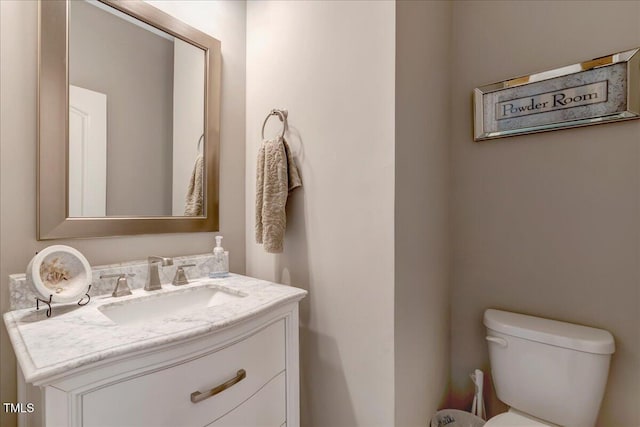 2062 Montgomery Dr, Franklinton, NC 27525 - half bathroom featuring vanity and toilet