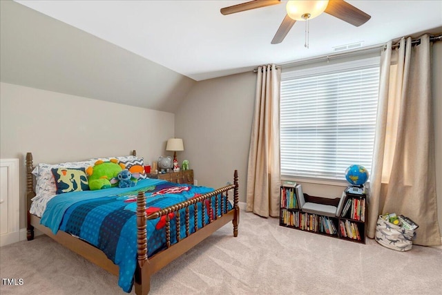 2062 Montgomery Dr, Franklinton, NC 27525 - carpeted bedroom with vaulted ceiling and ceiling fan