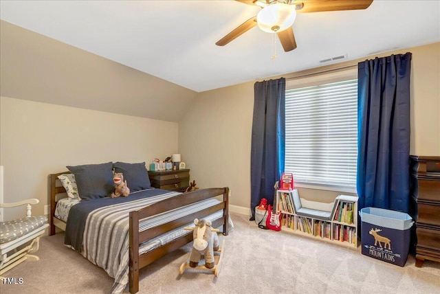 2062 Montgomery Dr, Franklinton, NC 27525 - carpeted bedroom with lofted ceiling and a ceiling fan