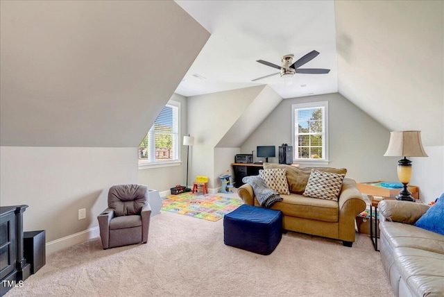 2062 Montgomery Dr, Franklinton, NC 27525 - carpeted living room with ceiling fan, lofted ceiling, and baseboards