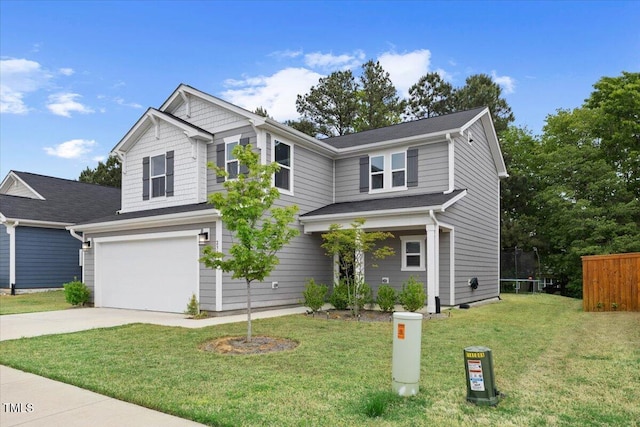 view of front of house with a garage, a front lawn, fence, concrete driveway, and a trampoline