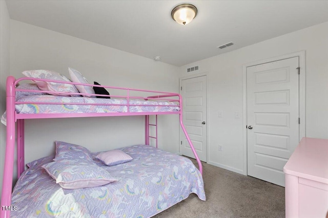 bedroom with carpet flooring and visible vents