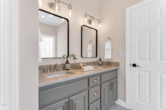 205 Carlyle Cir, Goldsboro, NC 27530 - bathroom with double vanity, tile patterned floors, and baseboards