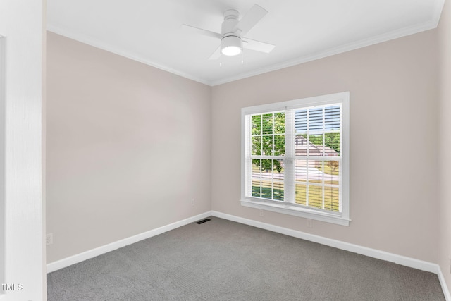 205 Carlyle Cir, Goldsboro, NC 27530 - spare room featuring dark carpet, ornamental molding, baseboards, and ceiling fan