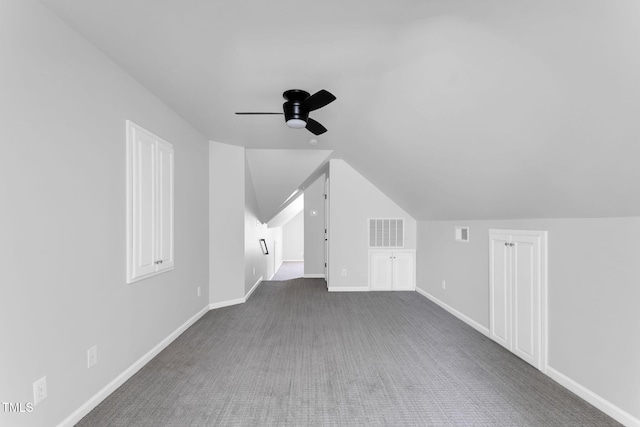 205 Carlyle Cir, Goldsboro, NC 27530 - additional living space with a ceiling fan, vaulted ceiling, carpet, and baseboards