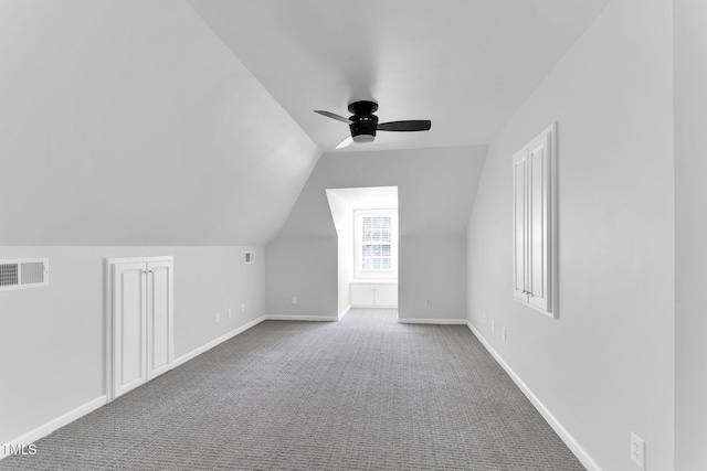 205 Carlyle Cir, Goldsboro, NC 27530 - additional living space with ceiling fan, lofted ceiling, carpet floors, and baseboards