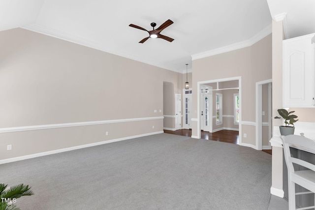 205 Carlyle Cir, Goldsboro, NC 27530 - living room with dark carpet, ceiling fan, crown molding, and baseboards