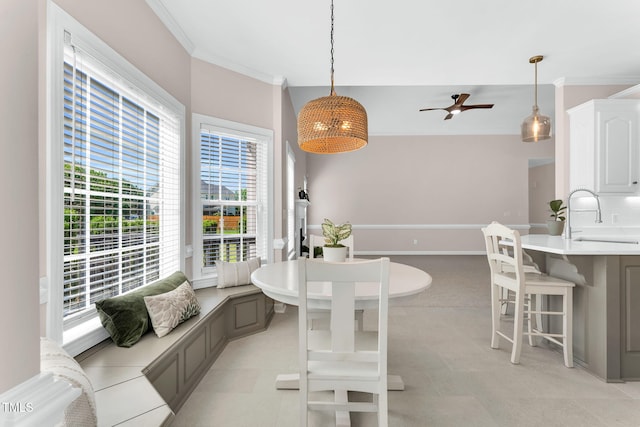 205 Carlyle Cir, Goldsboro, NC 27530 - dining area featuring ornamental molding, ceiling fan, and baseboards