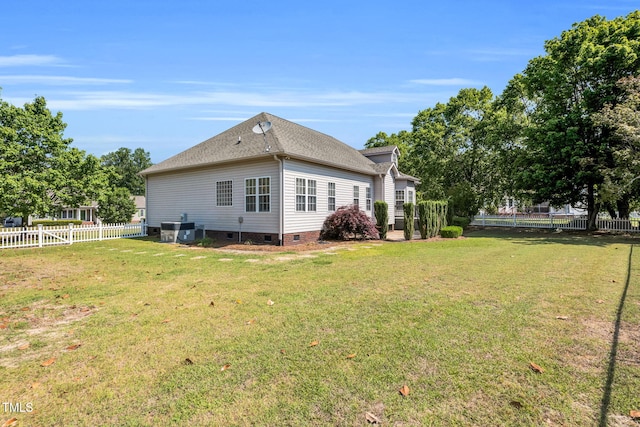 205 Carlyle Cir, Goldsboro, NC 27530 - rear view of property with crawl space, central AC, and a shingled roof