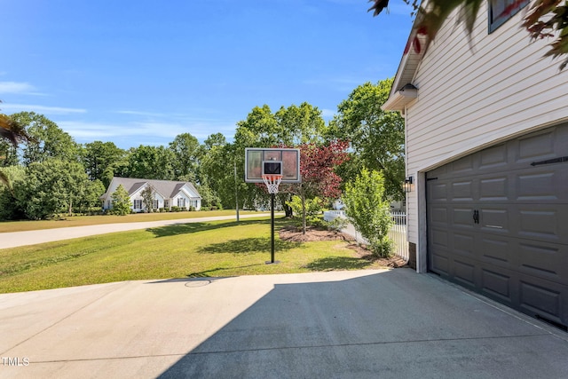 205 Carlyle Cir, Goldsboro, NC 27530 - view of sport court with a lawn