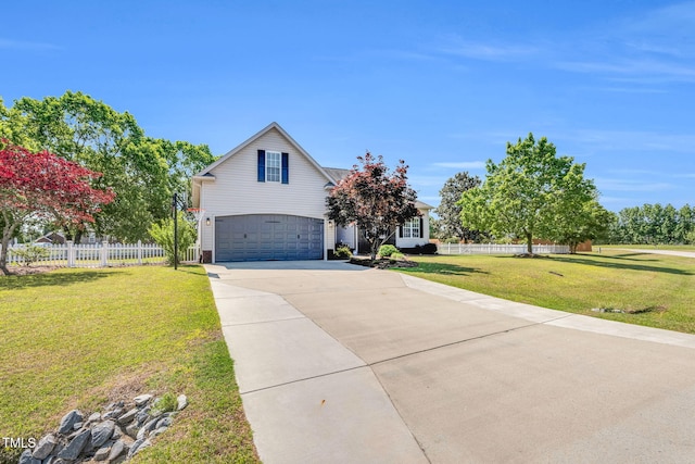 205 Carlyle Cir, Goldsboro, NC 27530 - view of side of property with an attached garage and concrete driveway