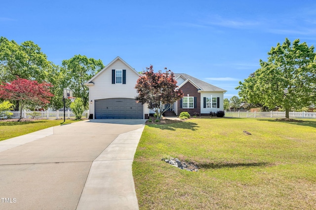 205 Carlyle Cir, Goldsboro, NC 27530 - traditional home featuring a garage and driveway