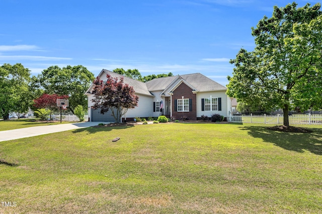 205 Carlyle Cir, Goldsboro, NC 27530 - view of front of house with driveway, an attached garage, and brick siding