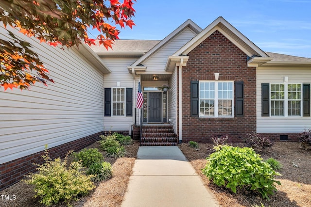 205 Carlyle Cir, Goldsboro, NC 27530 - property entrance with brick siding and roof with shingles