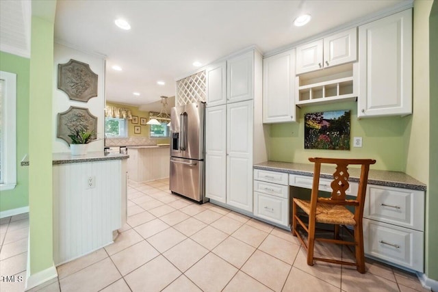 kitchen featuring visible vents, tasteful backsplash, stainless steel fridge with ice dispenser, recessed lighting, and white cabinetry