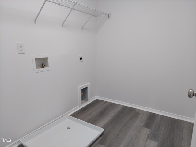 washroom featuring laundry area, hookup for a washing machine, dark wood finished floors, baseboards, and hookup for an electric dryer